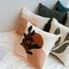 Les textiles Patlin Kozy Cushion - Black Foliage With Arches* Cushions